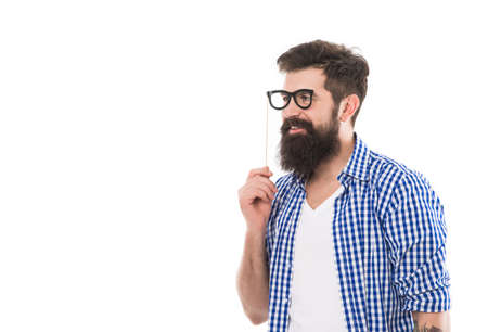 cheerful brutal bearded man hold party accessory isolated on white background with copy space
