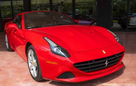 Miami Beach, Florida USA - April 15, 2021: red Ferrari California roadster, corner view