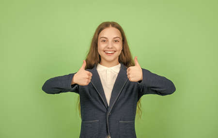 back to school. knowledge day. childhood education. kid in uniform. september 1.の写真素材