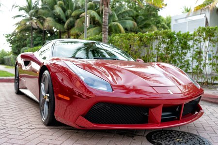 Miami Beach, Florida USA - April 18, 2021: red Ferrari 488 GTB car, corner view low angle