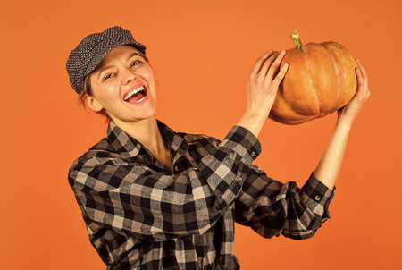 Fresh vegetables. vintage girl hold pumpkin and maple leaves. halloween. Welcome autumn. colors of fall season. Harvest time concept. happy farmers with gourd vegetable. woman retro peaked hatの写真素材