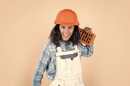Building tomorrow. girl in workshop uniform. repairing tools used in engineering. architect working...
