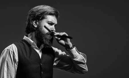 Man hairdresser barbershop stylist well groomed appearance, straight razor concept