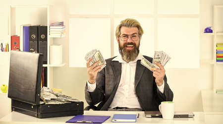 Businessman with cash. Bank account. Credit and cash concept. Financial consulting. Financial director. Corporate finance. Economics concept. Cash turnover. Tax payment. Company income fraudの写真素材