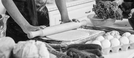 girl kid in chef apron and hat cooking, greeneryの写真素材