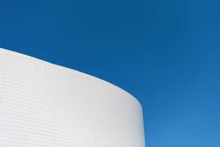 abstract architectural detail of facade exterior architecture on blue sky, copy space