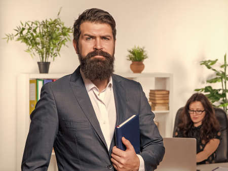 Be professional. Businessman with personal organizer. Business professional. Professionalism alwaysの写真素材