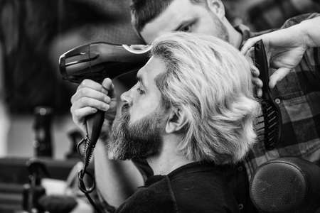 Choose with your wish. beauty and fashion. dye hair and give new shape. male hairdresser salon. barber professional master. making new hairstyle. man get haircut. fashionable hairdo for real menの写真素材