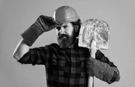 Confident in his style. mature guy builder with beard and moustache. foreman in uniformの写真素材