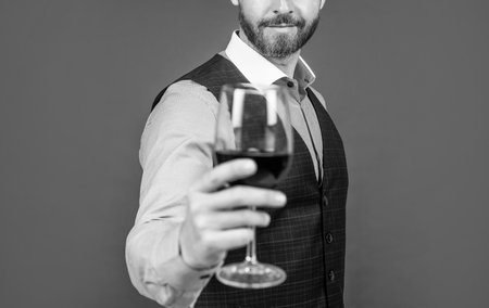 sommelier. guy drink red wine. cheers for happy valentines day. alcohol drinking.の写真素材