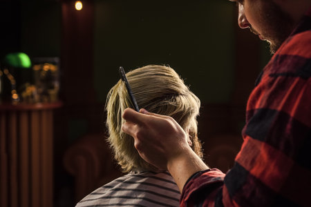 Mens beauty and health. man want new hairstyle. male beauty and fashion. mature man at barbershop. brutal bearded man at hairdresser. professional barber with male clientの写真素材