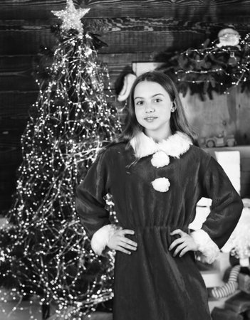 Capturing a happy moment. small girl wait new year. xmas party is on. happy childhood. this winter...