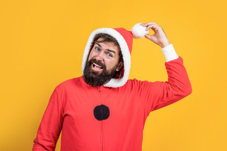 santa claus bearded man wish happy new year and merry christmas holiday ready to celebrate winter party with fun and joy full of xmas presents and gifts, having funの写真素材