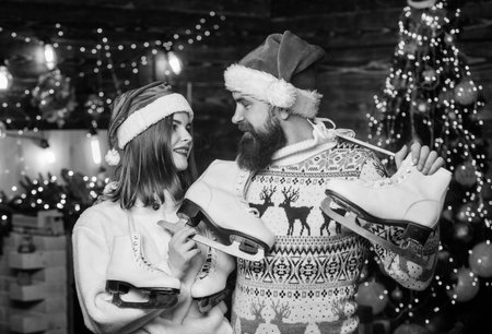 Winter sports. Equipment outdoor sport. Christmas gift. Winter holidays. Active winter. Happy couple...