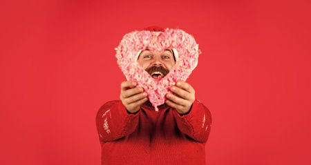 Let me Melt Your Heart. Welcome Christmas into your heart. Handsome man love winter holidays red...