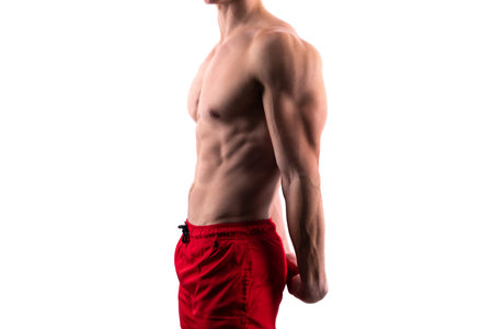 muscular fitness sportsman isolated on white background. cropped view of sportsmanの写真素材