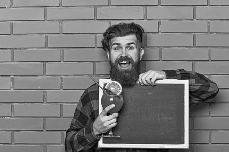 Schedule concept. Barman with beard and happy faceの写真素材