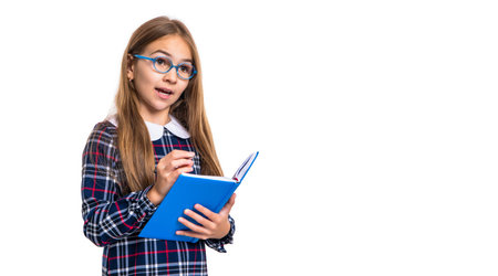 amazed school girl in noting notes isolated on white background. school girl noting notes