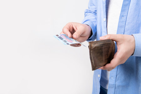 moneyless man with wallet isolated on studio background with copy space.の写真素材