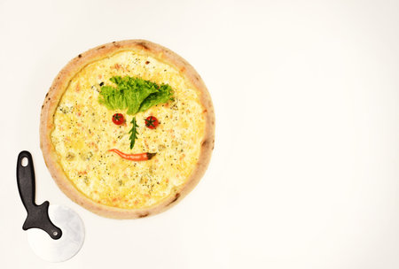 Four cheeses pizza near special knife. Pizza with mozzarellaの写真素材