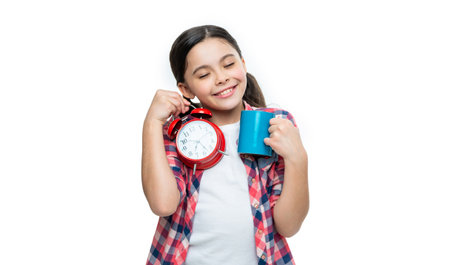 happy girl with cocoa and alarm clock isolated on white. girl with cocoa and alarm clock