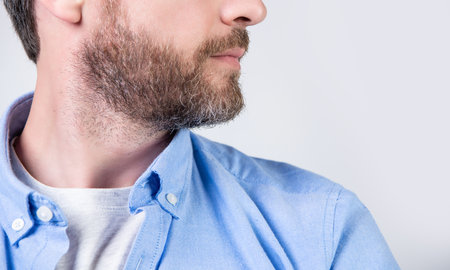 bearded man with beard and chin in studio. photo of bearded man with beard.の写真素材