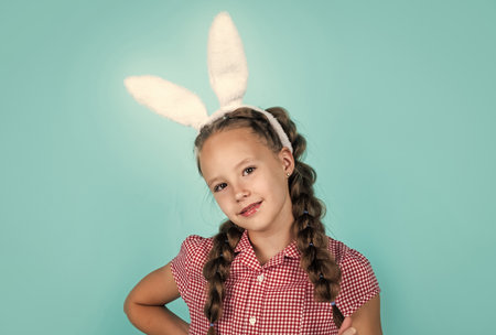 happy teen girl wear bunny ears. happy easter. childhood happiness. child in rabbit costume.の写真素材