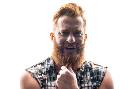happy brutal bearded man isolated on white. brutal bearded man in studio.の写真素材