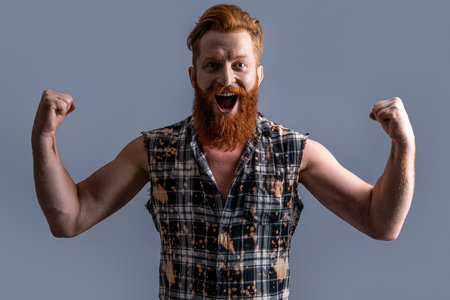 successful brutal bearded guy on background. photo of brutal bearded guy with beard.の写真素材