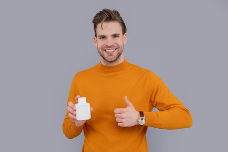 Medicine bottle for medical or pharmaceutical product. Presenting product in blank plastic bottle