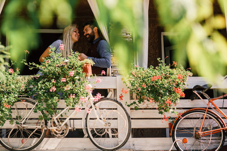 Lovers find place for secret dates. Blonde woman and bearded man happy to see each other.の写真素材