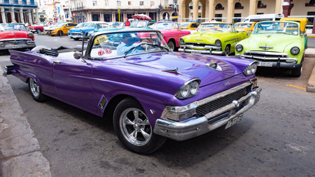 Havana, Cuba - May 02, 2019: violet ford convertible retro car. taxi grancar