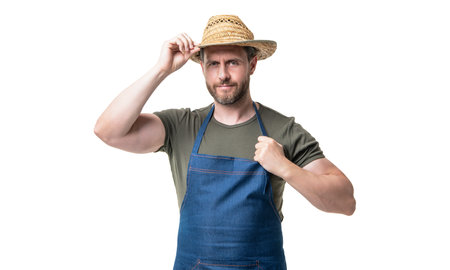 caucasian rural worker in hat and apron isolated on white backgroundの写真素材