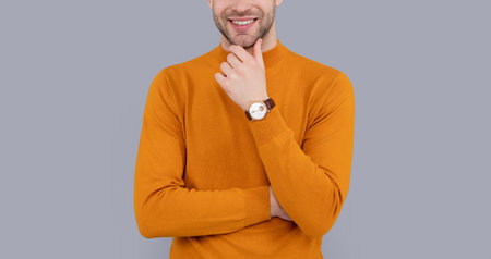 cropped view of man isolated on grey background. man in studio. man with watch. photo of man