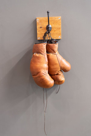 boxing gloves sportswear. boxing gloves sportswear hanging on the wall.の写真素材