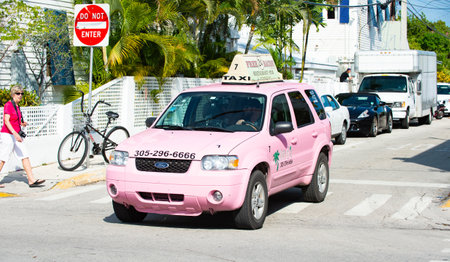 Key West, Florida USA - January 09, 2016: suv Ford Escape pink taxi carのeditorial素材