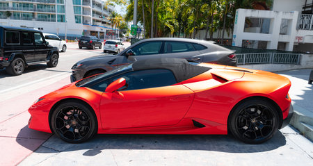 Los Angeles, California USA - April 14, 2021: orange Lamborghini Aventador parked in LA. side viewのeditorial素材