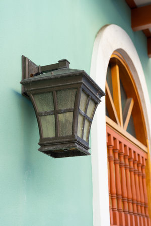 streetlamp lantern closeup. photo of streetlamp lantern on building. streetlamp lantern on wall.の写真素材