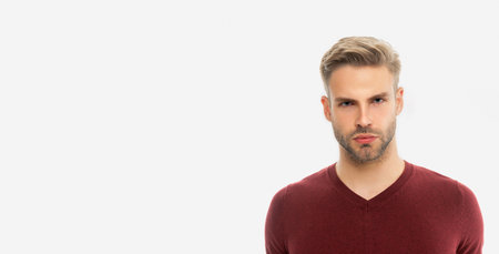 guy with stubble in studio with copy space. guy with stubble on background. photo of guyの写真素材