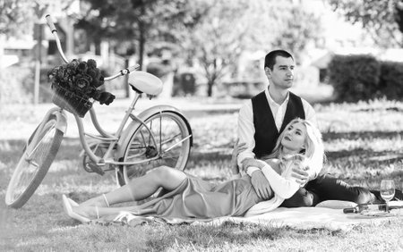 Happy together. My darling. Idyllic moment. Man and woman in love. Picnic time. Spring date. Playful...