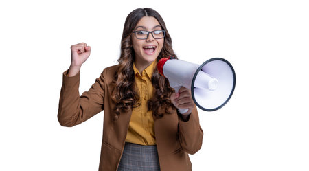 shouting teen girl announcer on background. photo of teen girl announcer with megaphone.の写真素材