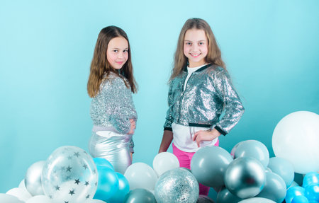 Gorgeous and beautiful. Small fashion models. Fashionable children in fashion clothing. Little girls with adorable fashion look. They love fashionの写真素材