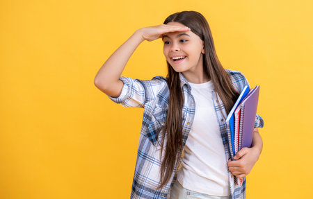teen school girl in studio, copy space. teen school girl on background.の写真素材