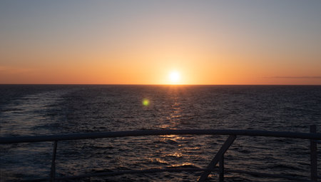 beautiful sunset at sea water. photo of romantic sunset at sea. sunset at sea nature.の写真素材