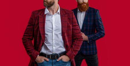 cropped view of formal elegant men at studio. formal elegant men on background.の写真素材