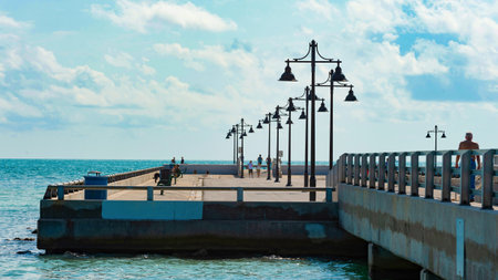 deck pier promenade with street lamp at seaside. deck pier promenade pathway.の写真素材