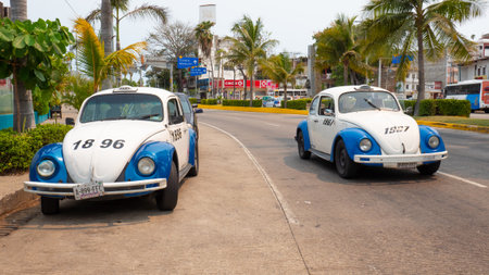 Acapulco, Mexico - May 12, 2019: Volkswagen beetle taxi retro sport car, front viewのeditorial素材
