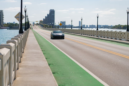 Miami, Florida USA - April 15, 2021: 2013 Porsche 911 Carrera car on the empty roadのeditorial素材