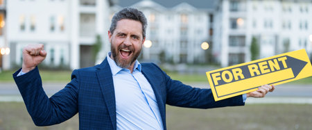 renter adviser man hold board for rent sign with copy space. rent house with renter adviser man