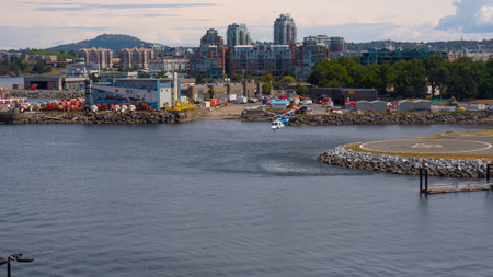 Victoria, Canada - June 28, 2019: helicopter taking off helipad in heliport in sea ocean harborのeditorial素材